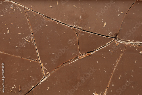 texture of broken milk chocolate close up. Pantone color  Mocha Mousse 