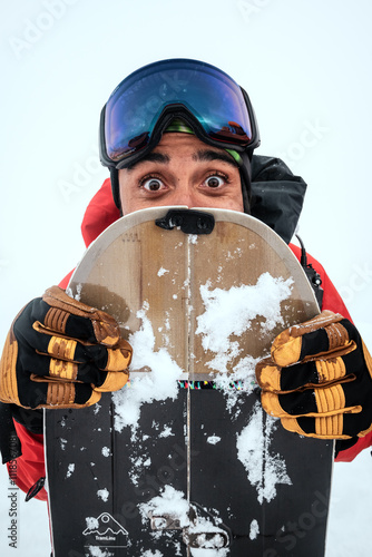 Funny snowboarder ogle eyes in a whiteout