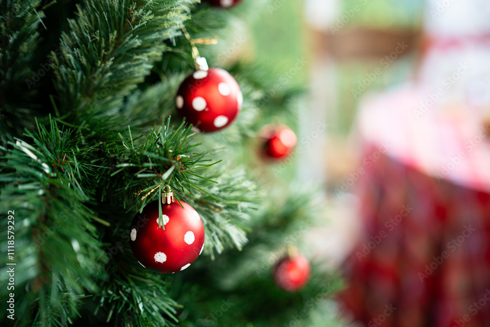 Merry x-mas,Close up of Colorful balls ,gifts box and Christmas greeting picture parcel,bell decoration on Green Christmas tree background Decoration During Christmas and New Year.