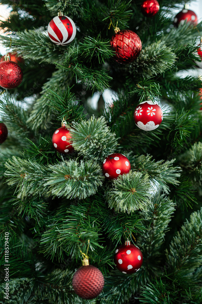 Merry x-mas,Close up of Colorful balls ,gifts box and Christmas greeting picture parcel,bell decoration on Green Christmas tree background Decoration During Christmas and New Year.