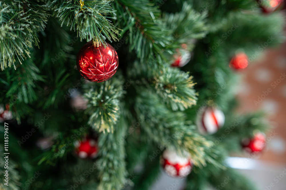 Merry x-mas,Close up of Colorful balls ,gifts box and Christmas greeting picture parcel,bell decoration on Green Christmas tree background Decoration During Christmas and New Year.