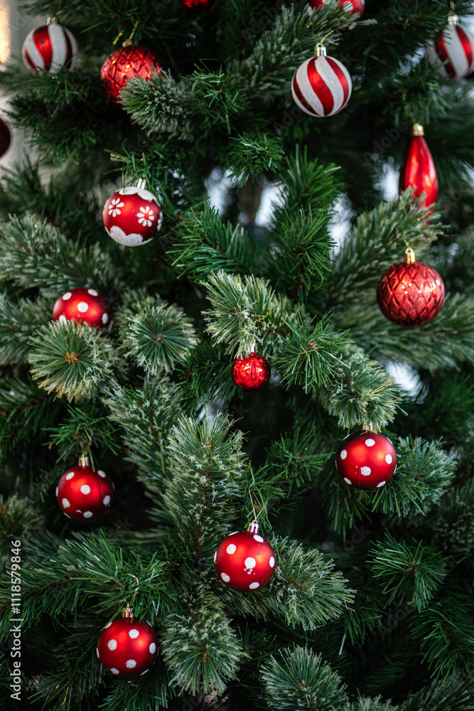 Merry x-mas,Close up of Colorful balls ,gifts box and Christmas greeting picture parcel,bell decoration on Green Christmas tree background Decoration During Christmas and New Year.