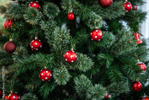Merry x-mas,Close up of Colorful balls ,gifts box and Christmas greeting picture parcel,bell decoration on Green Christmas tree background Decoration During Christmas and New Year.