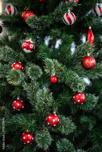 Obraz na płótnie Merry x-mas,Close up of Colorful balls ,gifts box and Christmas greeting picture parcel,bell decoration on Green Christmas tree background Decoration During Christmas and New Year. w salonie