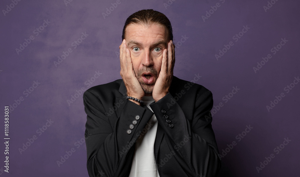 looking excited and surprised, open-mouthed with both hands on head, feeling like a lucky winner looking excited and surprised, open-mouthed with both hands on head, feeling like a lucky winner