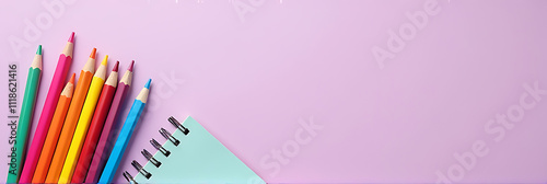 Colorful school supplies are arranged on a soothing pastel purple background ideal for back to school themed decor and design ideas_00001_