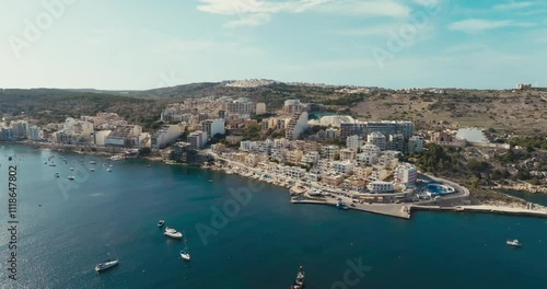 Wallpaper Mural Aerial Drone View of Bugibba Malta Showcasing Coastal Cityscape with Tourist Beaches Marina Yachts and Mediterranean Waters. High quality 4k footage Torontodigital.ca