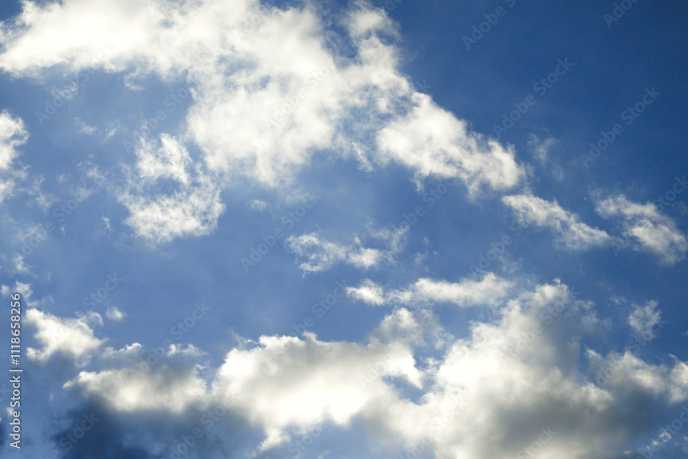 Beautiful cloud formations create a serene blue sky during the afternoon hours Beautiful cloud formations create a serene blue sky during the afternoon hours