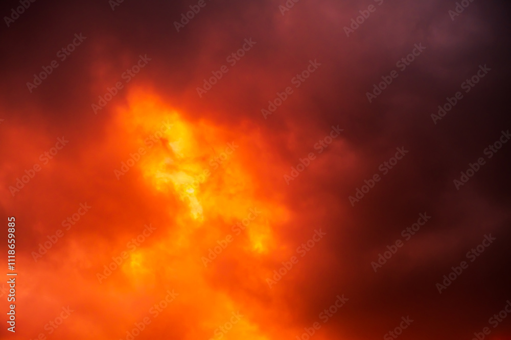 Dark red yellow orange sky with clouds. Gloomy dramatic storm skies. Background with space for design. Lightning volcano fire. Bright explosion flash. Horror, scary, creepy concept. High quality Dark red yellow orange sky with clouds. Gloomy dramatic storm skies. Background with space for design. Lightning volcano fire. Bright explosion flash. Horror, scary, creepy concept. High quality
