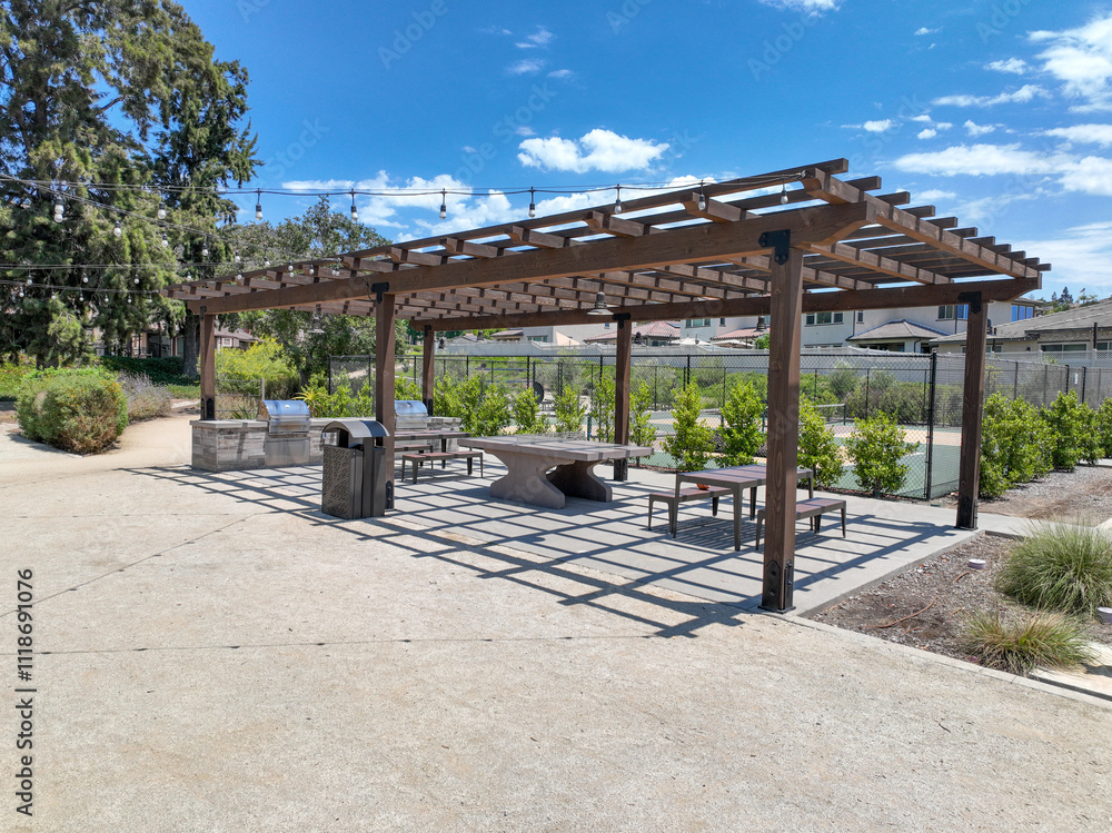 Covered gathering area in community park with picnic tables, Escondido, San Diego, California Covered gathering area in community park with picnic tables, Escondido, San Diego, California