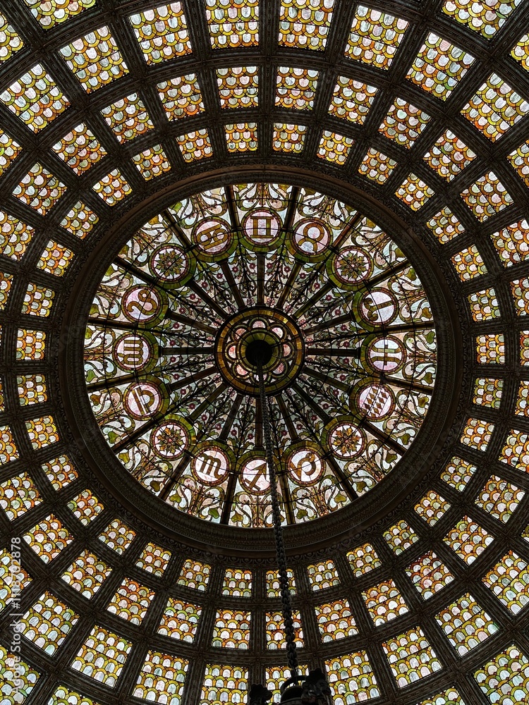 Worms eye view of a stained glass dome ceiling Worms eye view of a stained glass dome ceiling