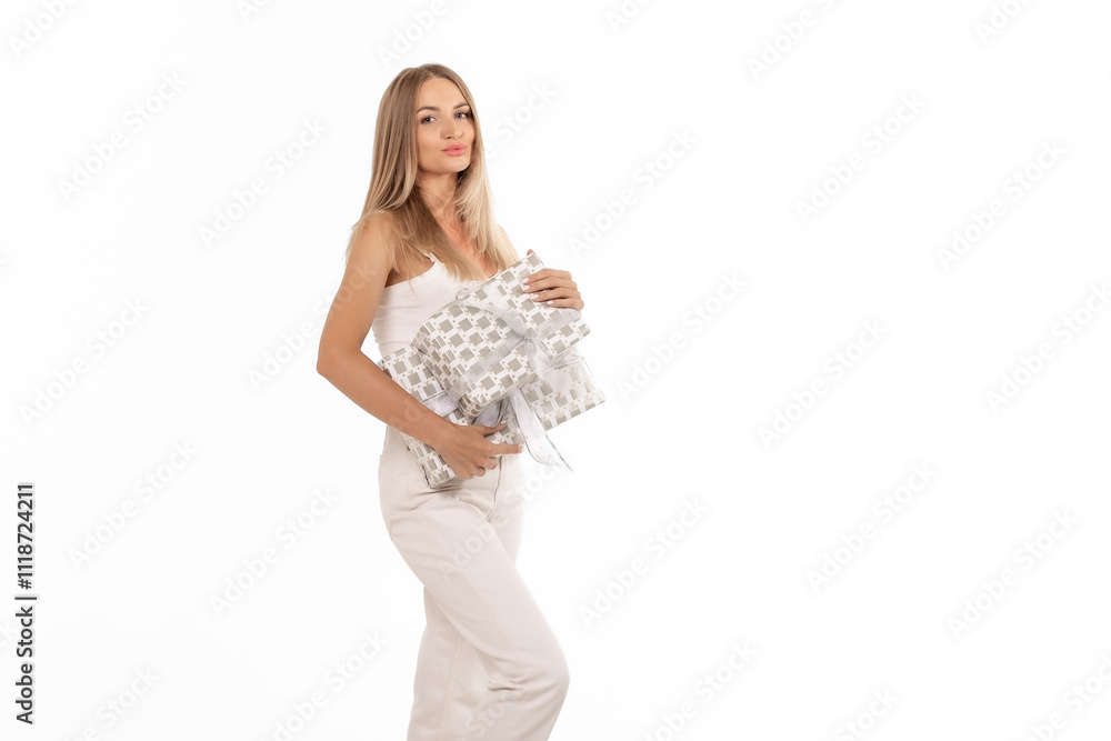 Young woman posing confidently while holding a stylish patterned blanket in a well-lit indoor setting Young woman posing confidently while holding a stylish patterned blanket in a well-lit indoor setting