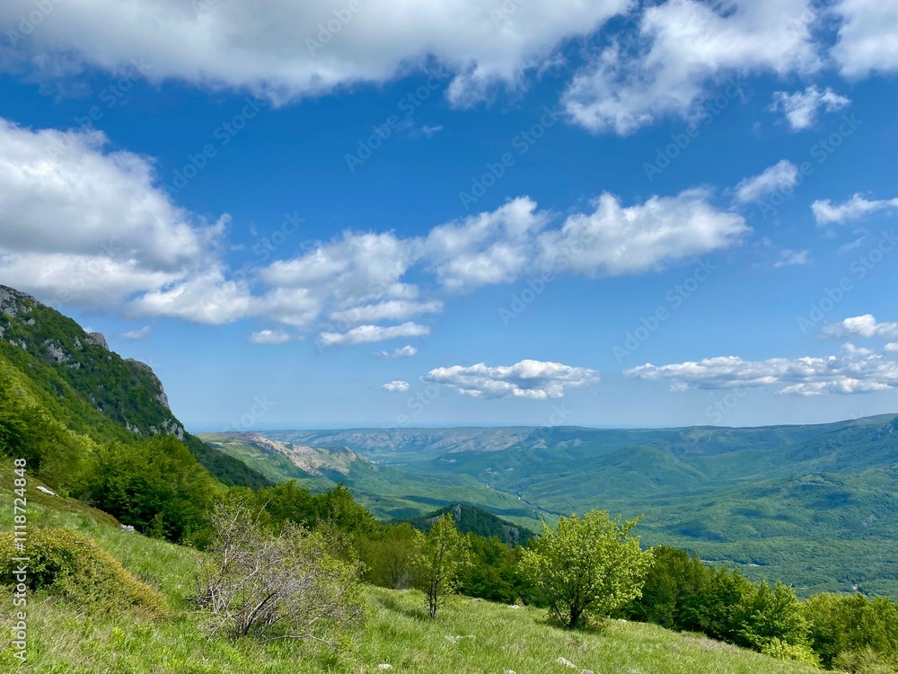 Naklejka premium beautiful spring mountain landscape with blue sky