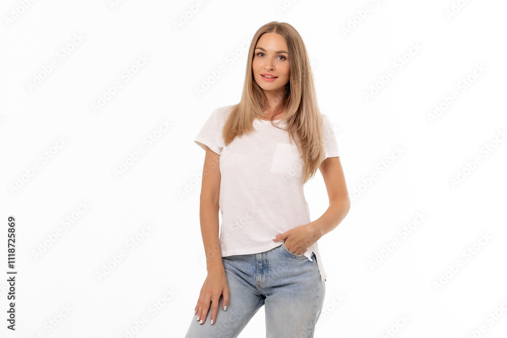Young woman with long hair poses confidently in a casual white t-shirt and jeans against a plain white background Young woman with long hair poses confidently in a casual white t-shirt and jeans against a plain white background