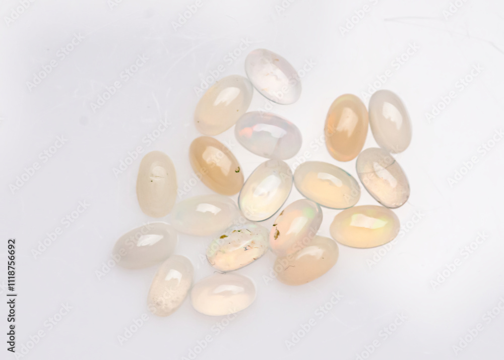Natural Opal Gems Displayed on White Background Natural Opal Gems Displayed on White Background