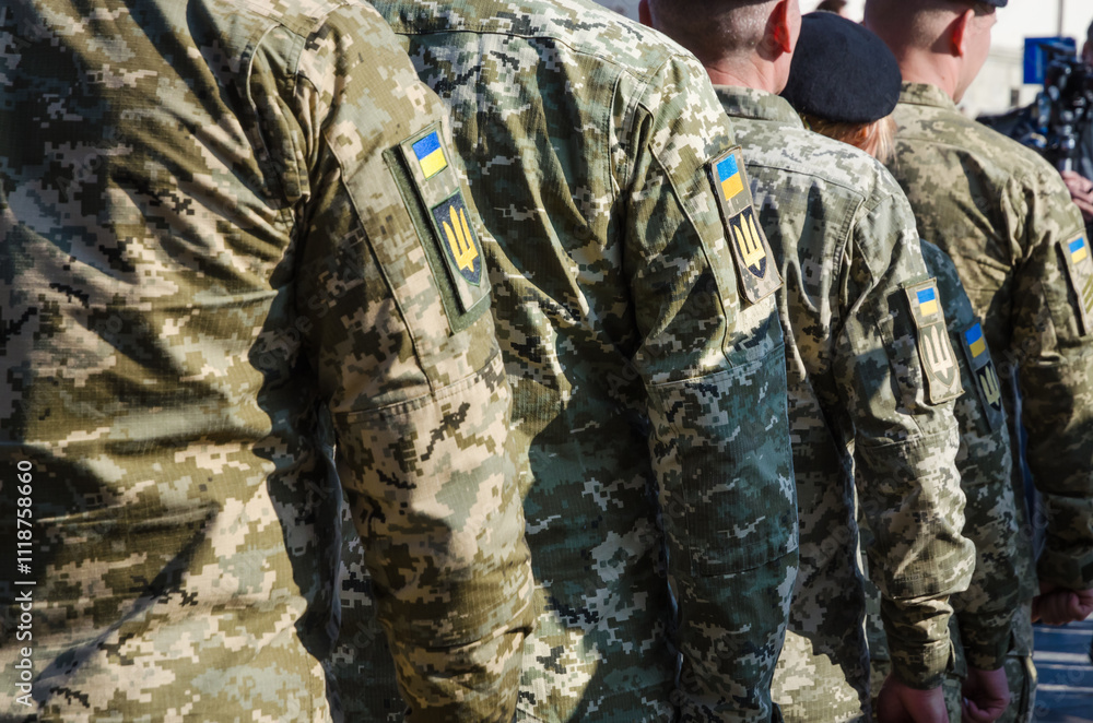 Ukrainian soldiers on military parade. Ukrainian flag on military uniform. Ukraine troops.