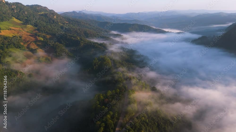 Aerial view of the beautiful morning mist over the mountains at Ban Ja Bo Village in Pang Ma Pha District, Mae Hong Son, Thailand Aerial view of the beautiful morning mist over the mountains at Ban Ja Bo Village in Pang Ma Pha District, Mae Hong Son, Thailand