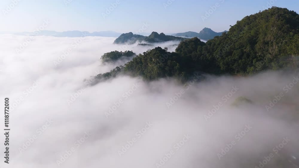 Aerial view of the beautiful morning mist over the mountains at Ban Ja Bo Village in Pang Ma Pha District, Mae Hong Son, Thailand Aerial view of the beautiful morning mist over the mountains at Ban Ja Bo Village in Pang Ma Pha District, Mae Hong Son, Thailand