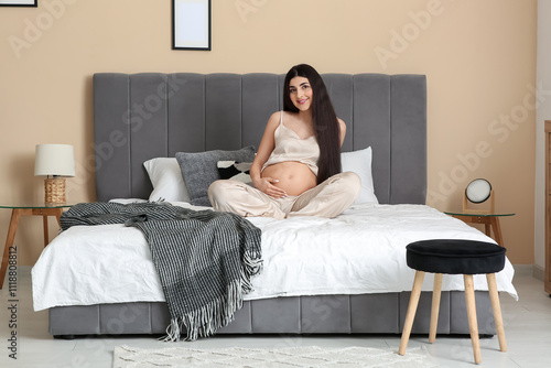 Beautiful pregnant woman on...