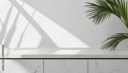 Empty marble countertop in minimalist interior with exotic green leaves, clean white background with sun rays. Template showcase scene for display, montage, advertising product, promotion, web design