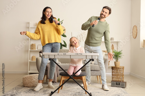 Photography Happy family with microphones and synthesizer singing karaoke at home