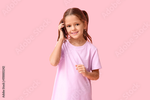 Happy little girl talking b...