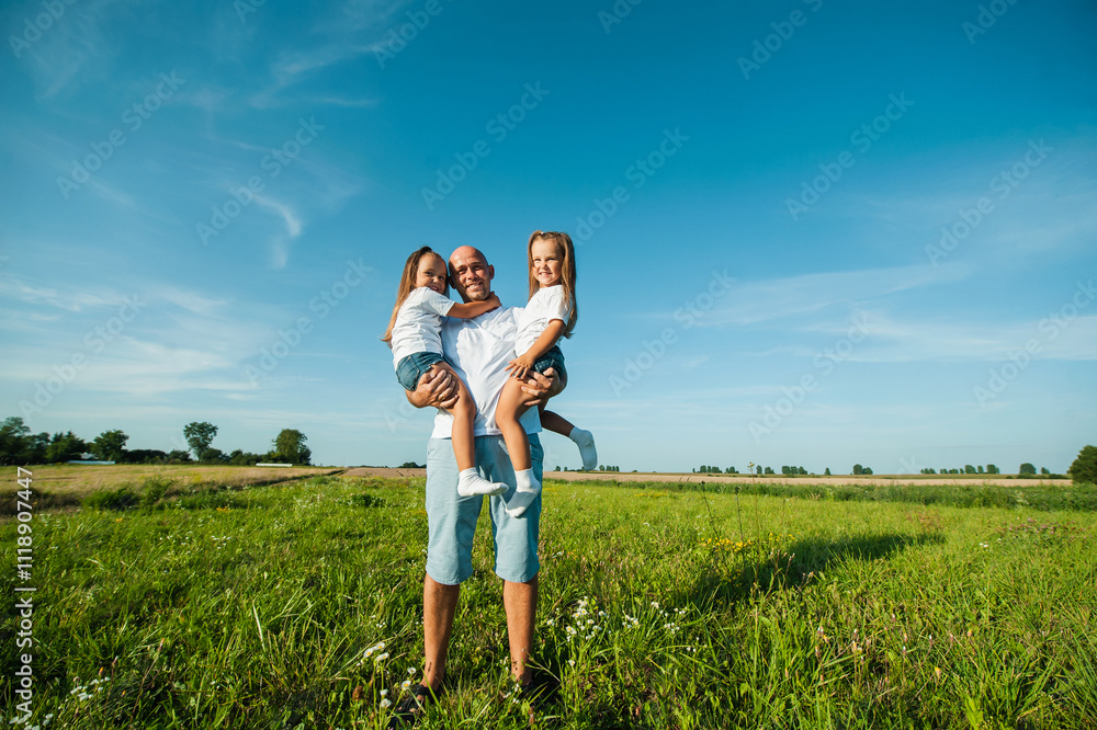 dad and two kids.Nature, blue sky, family rest