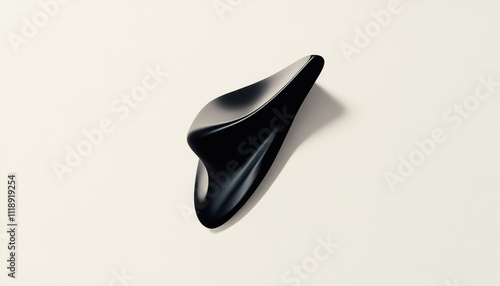 A sleek black object with a smooth, flowing design.