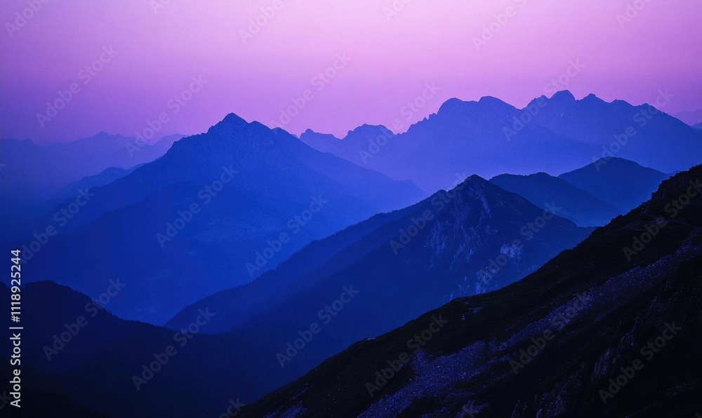 Serene mountain landscape at dusk with purple and blue hues. Serene mountain landscape at dusk with purple and blue hues.