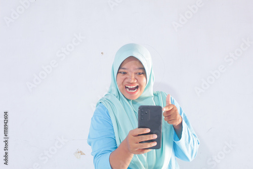 Happy Blue Hijab Woman Holding Smartphone on White Background