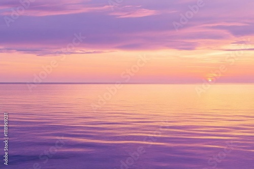 Serene sunset over calm waters, creating a peaceful atmosphere.