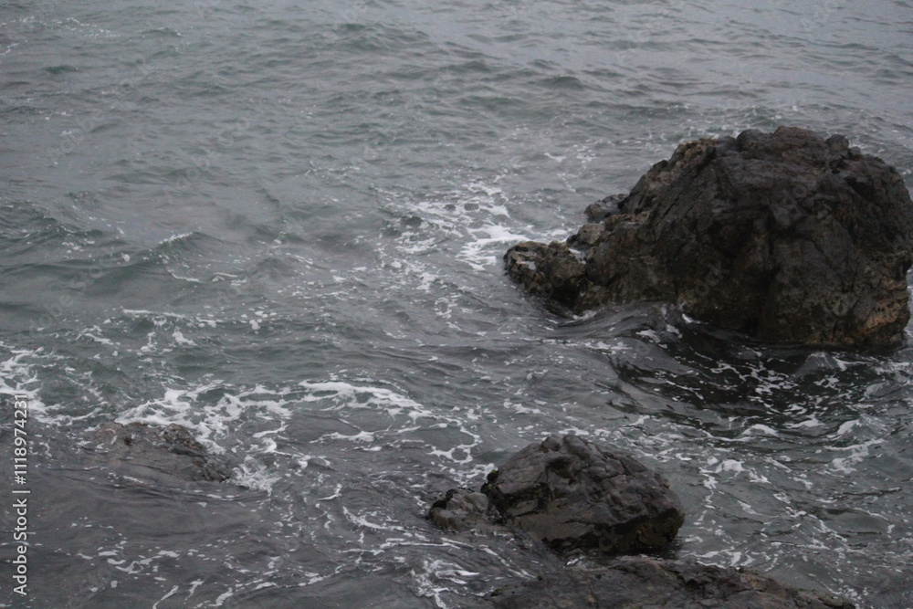Naklejka premium Image of waves crashing on Imrang Beach in Busan, Korea 