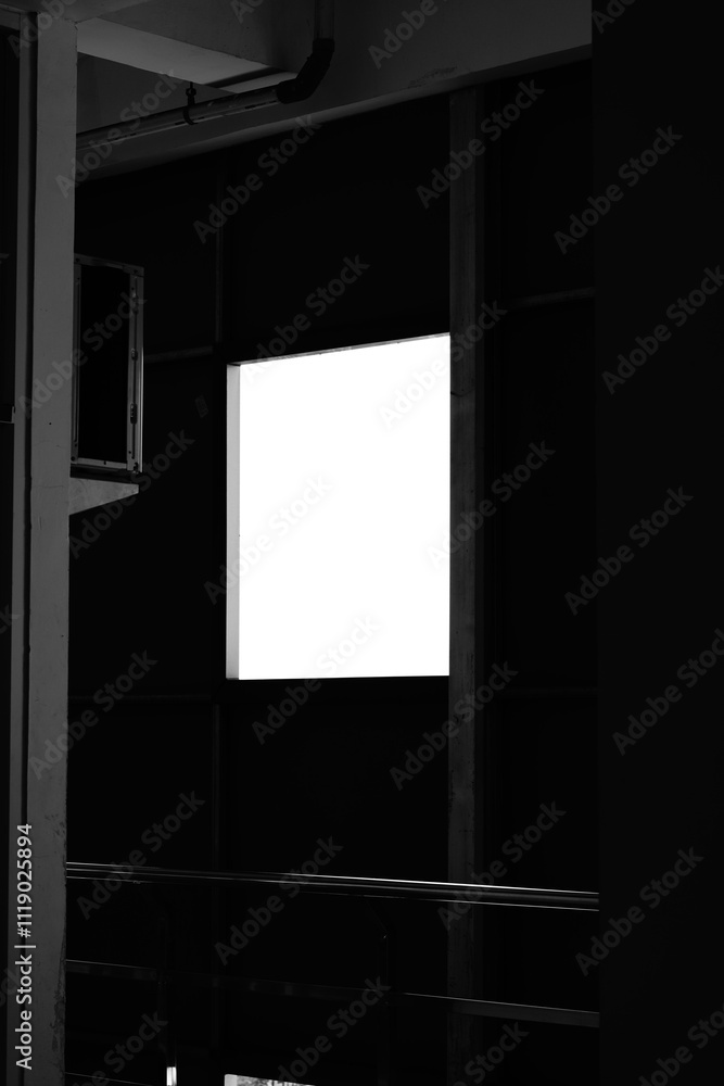 A box hole in a minimalist multi-storey building near the outdoor air conditioner A box hole in a minimalist multi-storey building near the outdoor air conditioner