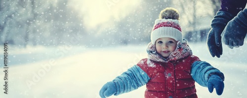 A child learning to skate with their parent s guidance, bundled in cozy winter gear, on a snowy day photo