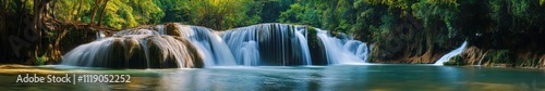 Serene Waterfall Cascades Through Lush Green Forest