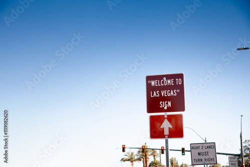 Canvas Print Directional sign pointing to the 'Welcome to Las Vegas' sign, a popular tourist attraction in the city