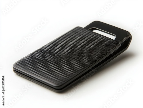 Sleek carbon fiber money clip wallet minimalist and ultrathin on a white surface with geometric features photo