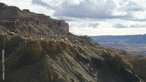 Aerial of bentonite hills in Big Water Utah revealing horizon photo