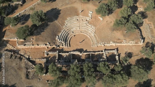 Tourists Walk Around Ancient Outdoor Theater Of Aptera On Greek Island Of Crete 4K 60FPS photo