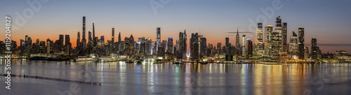 Wallpaper Mural Panorama of the skyline of Midtown Manhattan in New York before sunrise seen from Weehawken, New Jersey Torontodigital.ca