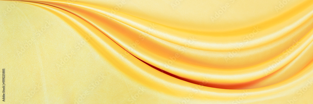 yellow gold satin texture that is white silver fabric luxurious shiny that is abstract silk cloth background with patterns soft waves blur beautiful. yellow gold satin texture that is white silver fabric luxurious shiny that is abstract silk cloth background with patterns soft waves blur beautiful.