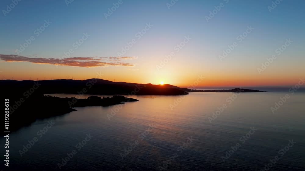 Bright Golden Sun Over The Calm Sea At Sunset. - aerial descend shot Bright Golden Sun Over The Calm Sea At Sunset. - aerial descend shot
