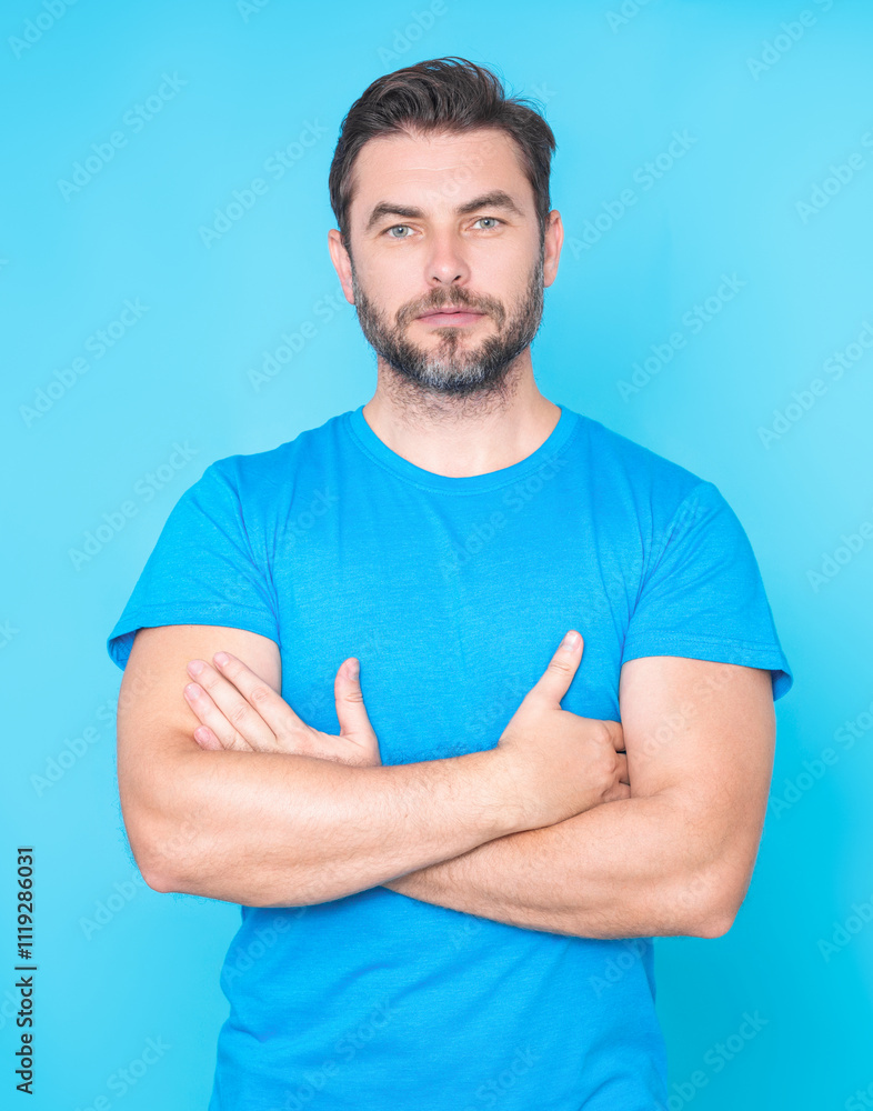 Studio Portrait of the handsome man crossed arms. A Hipster guy model headshot. Male face. Caucasian handsome man. Confident male model. Man looking proud. Closeup face of attractive man. Elegant guy. Studio Portrait of the handsome man crossed arms. A Hipster guy model headshot. Male face. Caucasian handsome man. Confident male model. Man looking proud. Closeup face of attractive man. Elegant guy.