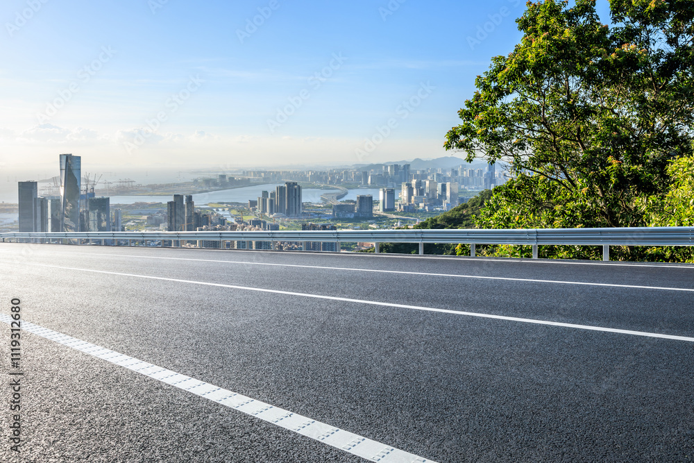 Asphalt highway road and city skyline with modern buildings scenery in Shenzhen. Outdoor road background.