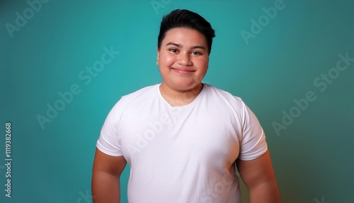  joyful young hispanic plus size body positive male man boy guy 30s in white blank design casual t-shirt posing color background studio portrait