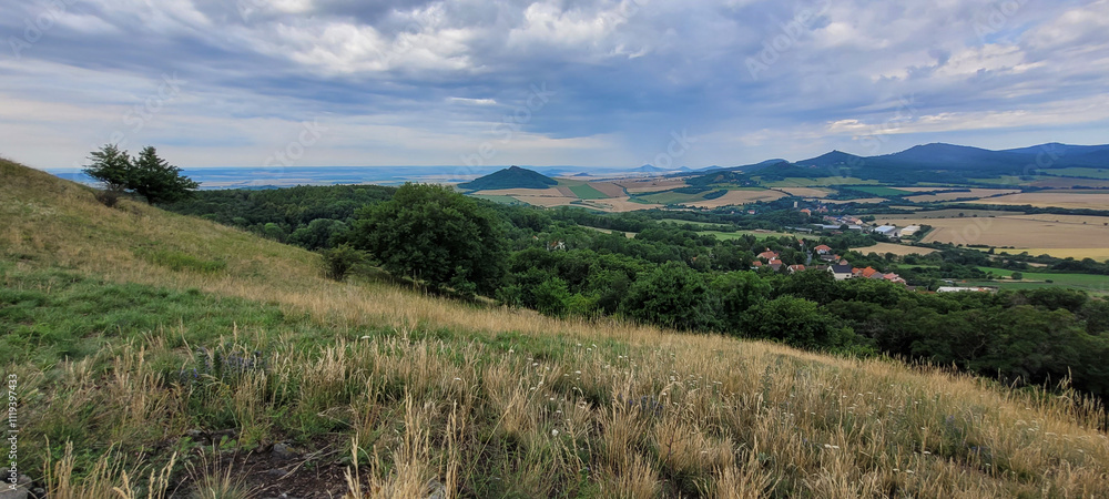 Fototapeta premium View of the landscape of the Bohemian Central Highlands from Holý vrch mountain. There is a great view in all directions from here.