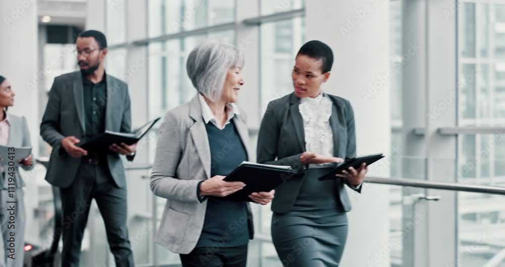Business, women and walking to meeting with tablet for financial briefing, budget planning and bookkeeping review. Accounting team, employees and documents for account feedback or invoice information Business, women and walking to meeting with tablet for financial briefing, budget planning and bookkeeping review. Accounting team, employees and documents for account feedback or invoice information