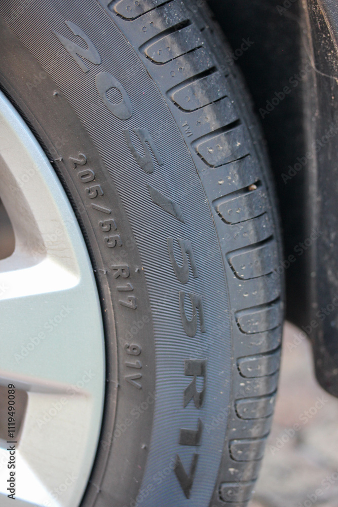 Portrait of a tire sized 205 55 R17 Portrait of a tire sized 205 55 R17