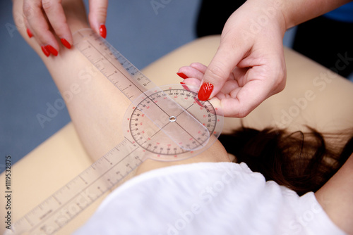 Measurement of shoulder joint range of motion during rehabilitation, assessing flexibility and recovery progress