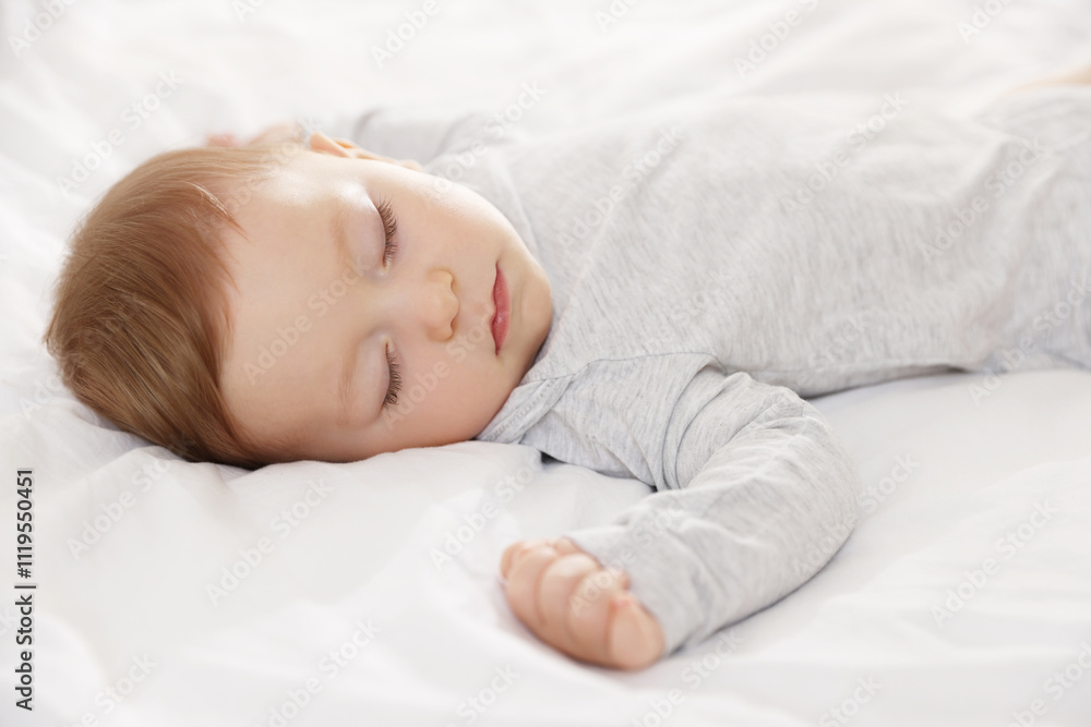 Cute little baby sleeping on bed at home Cute little baby sleeping on bed at home